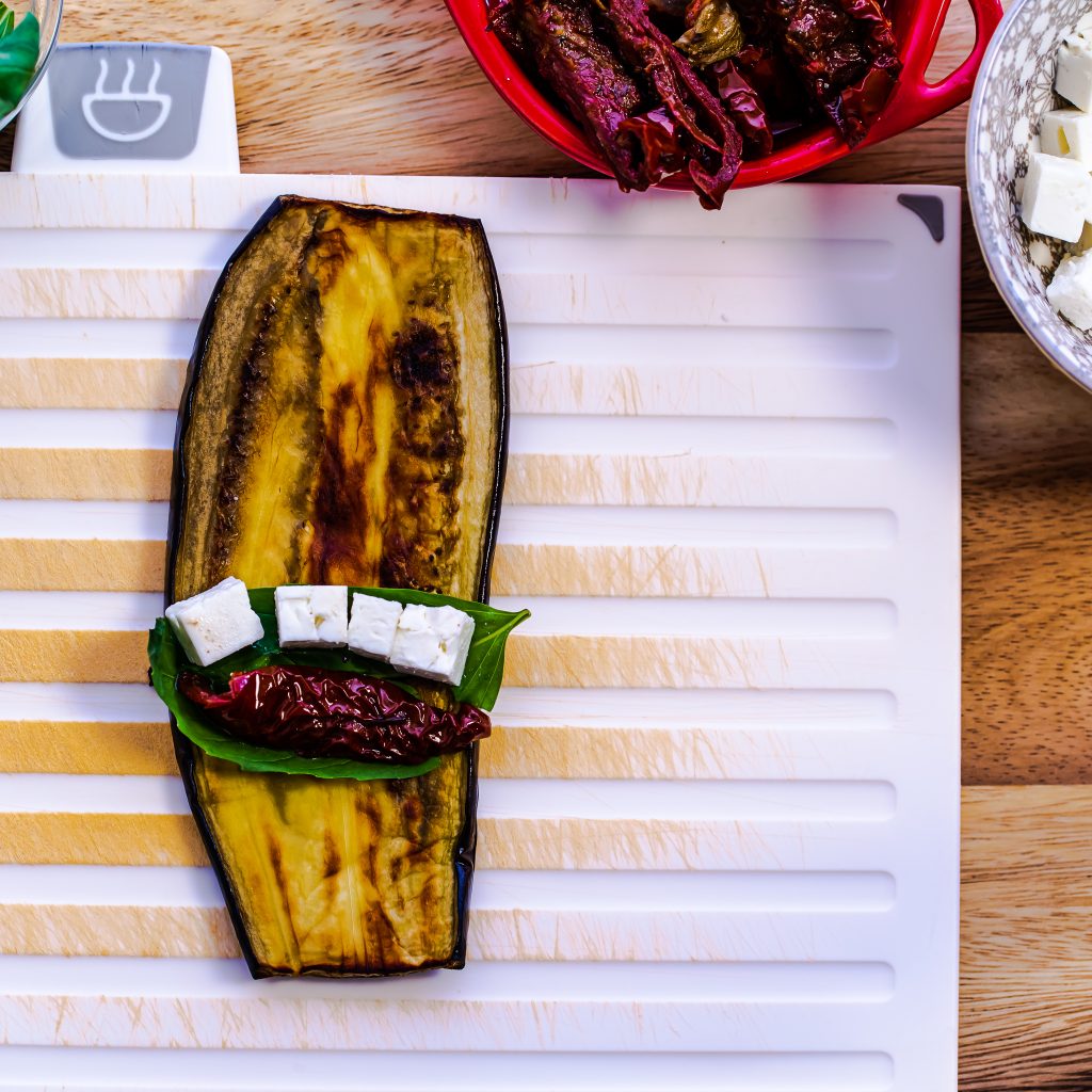 eggplant aubergine roasted slice basil leaves feta cheese sun dried tomatoes